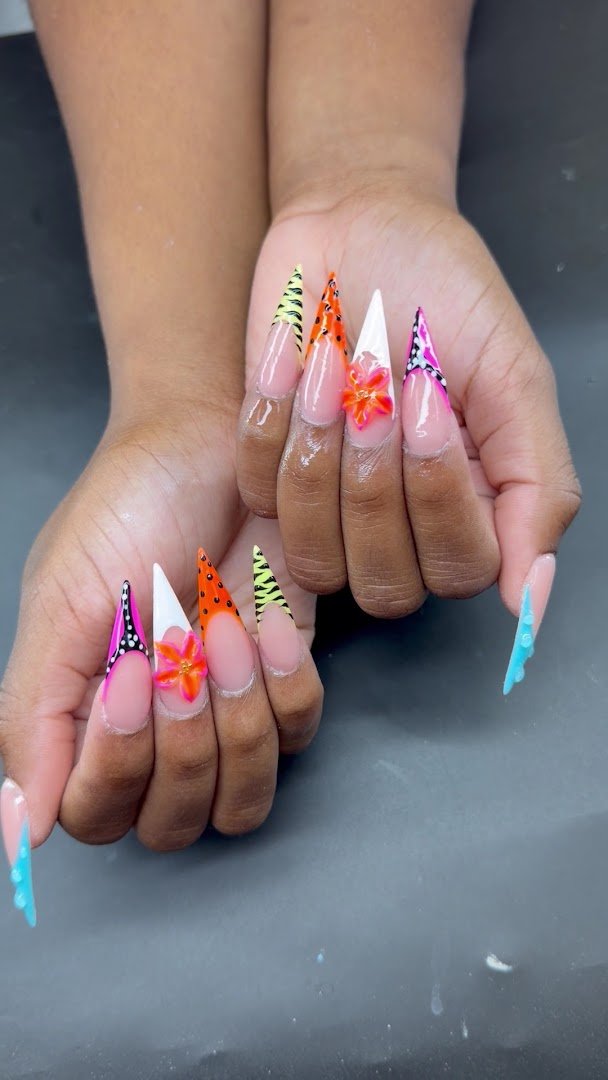 Nail technician working on acrylic nails