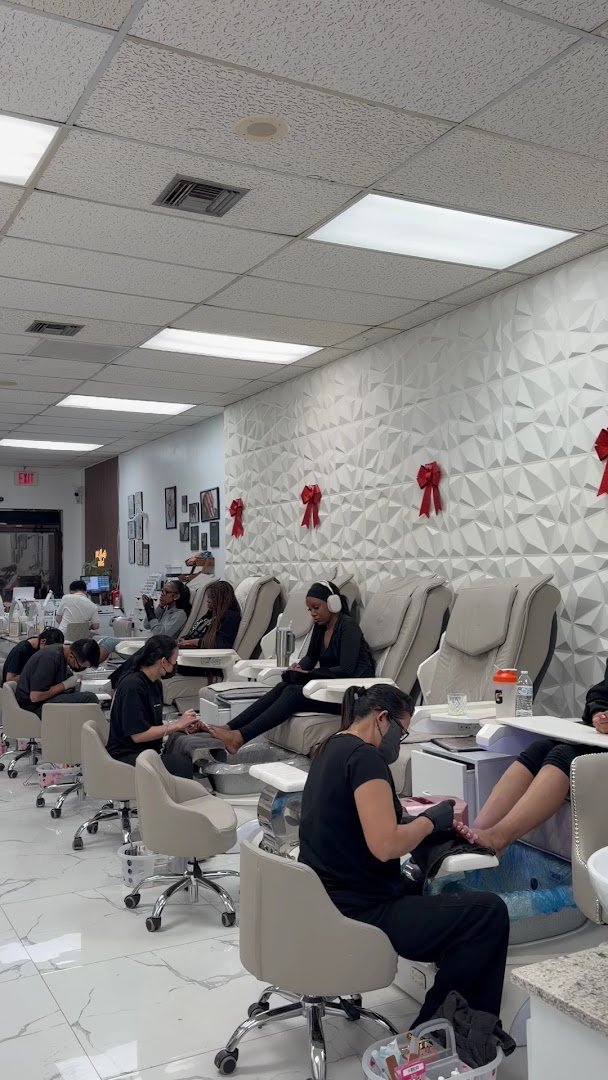 Bright salon interior with seating and tables